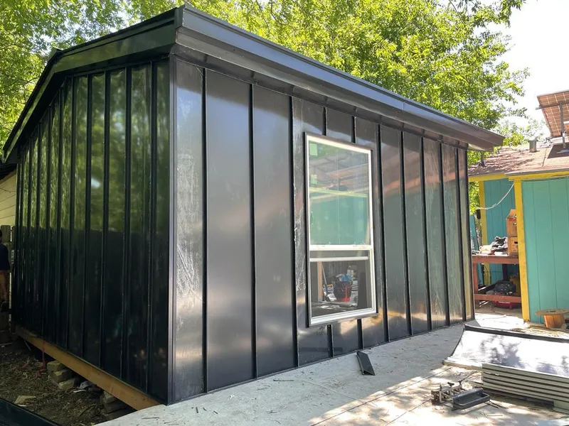 Black standing seam metal wall panels for Metal Roof Installation in Savannah